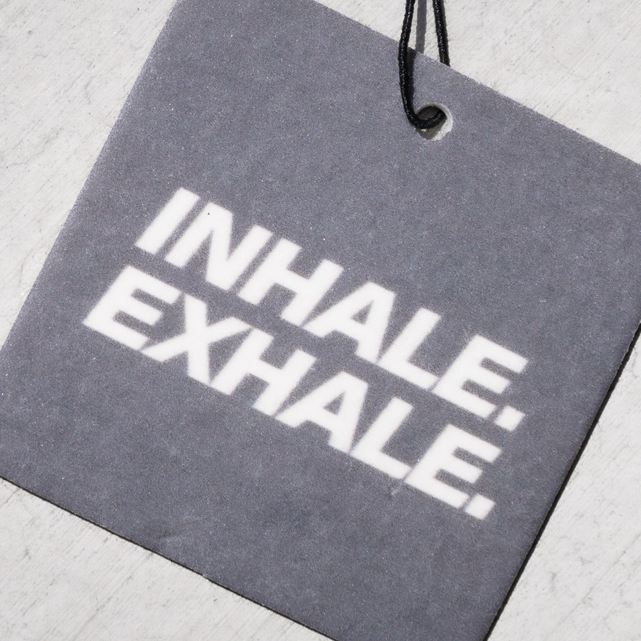 hiyo-rewards-merch-air-freshener-charcoal-front-detail-low.jpg