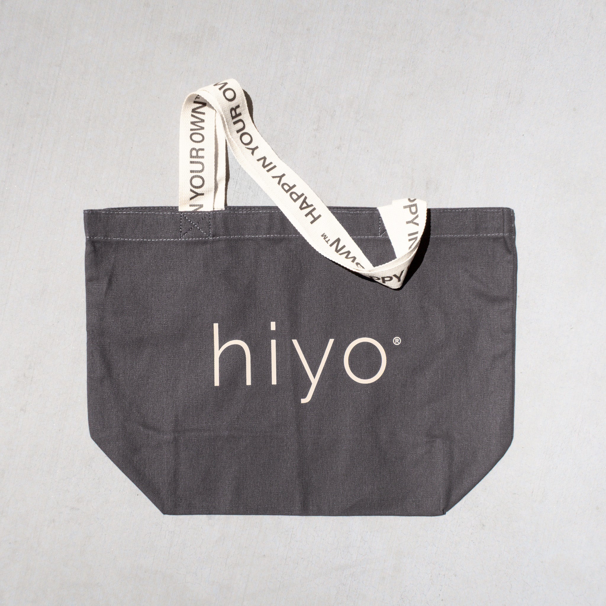 hiyo-rewards-merch-tote-charcoal-whatsinside-back-low.jpg