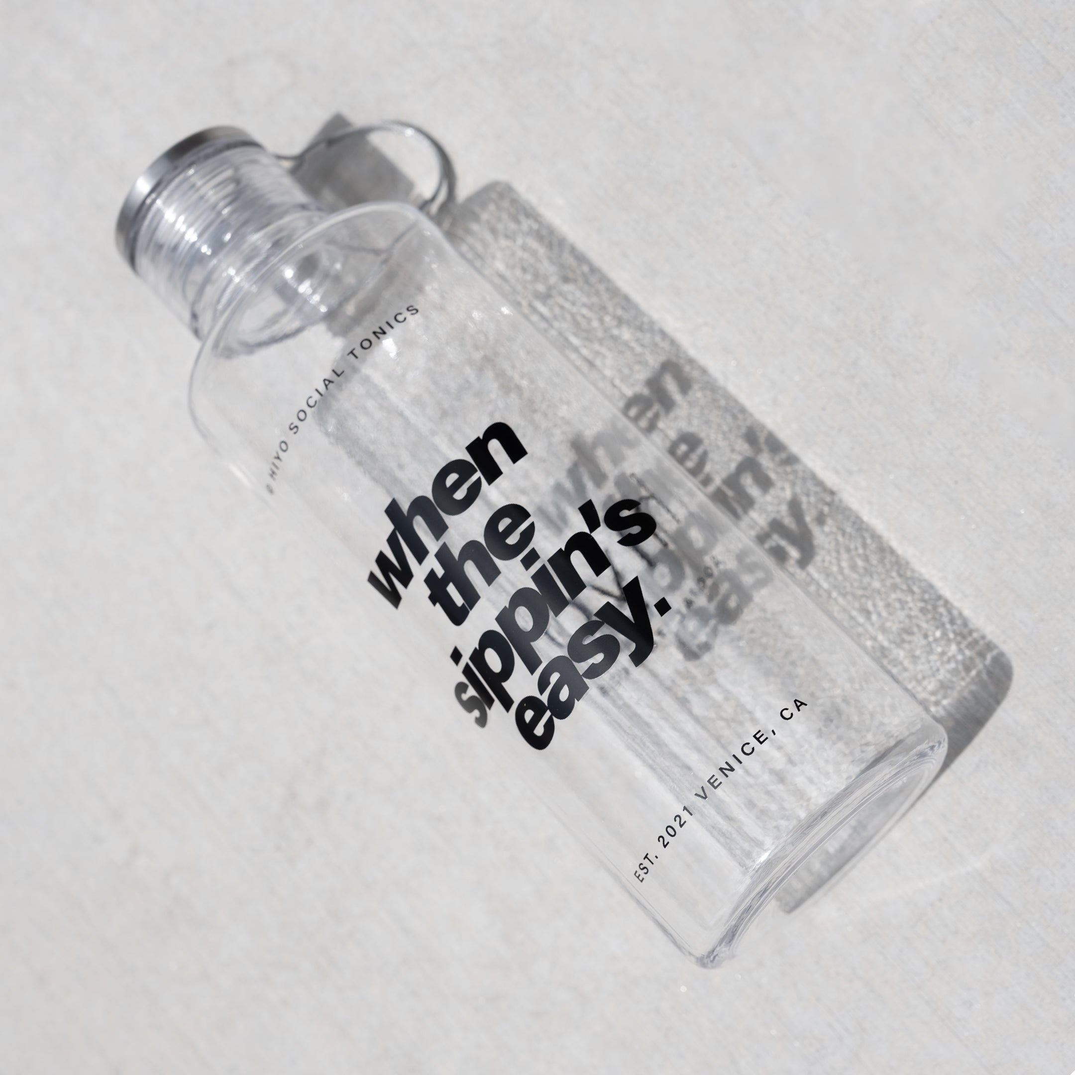 hiyo-summer-merch-water-bottle-1-sippin.jpg